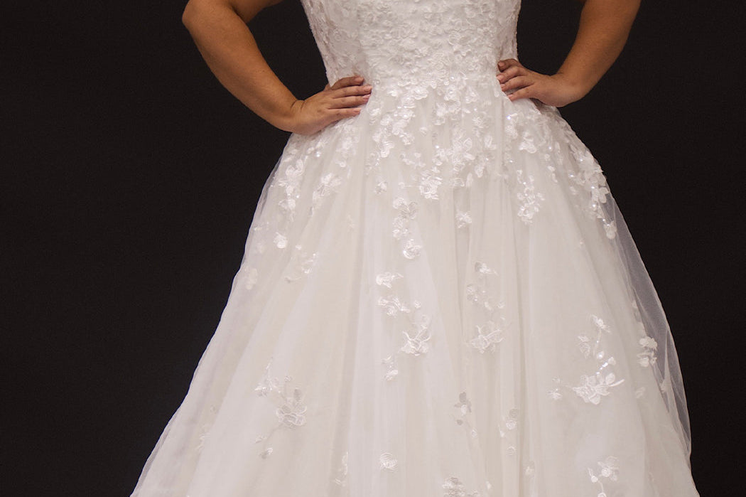 Michelle Bridal MB2308 Ivory. Soft bridal tulle, 3D floral lace appliques, A-line silhouette, Scoop neckline, Detachable pouf sleeve with lace and zipper on cuff included, Scoop back, Long invisible center back zipper, Full A-line skirt with 3D lace appliques on front and back.
