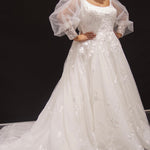 Michelle Bridal MB2308 Ivory. Soft bridal tulle, 3D floral lace appliques, A-line silhouette, Scoop neckline, Detachable pouf sleeve with lace and zipper on cuff included, Scoop back, Long invisible center back zipper, Full A-line skirt with 3D lace appliques on front and back.