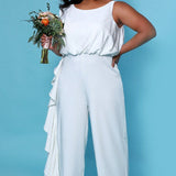 SC5244 Shania Jumpsuit by Sydney's Closet French Crepe fabric bra friendly sleeveless flounce on side of bodice and pant center back zipper available in Ivory