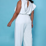 SC5244 Shania Jumpsuit by Sydney's Closet French Crepe fabric bra friendly sleeveless flounce on side of bodice and pant center back zipper available in Ivory