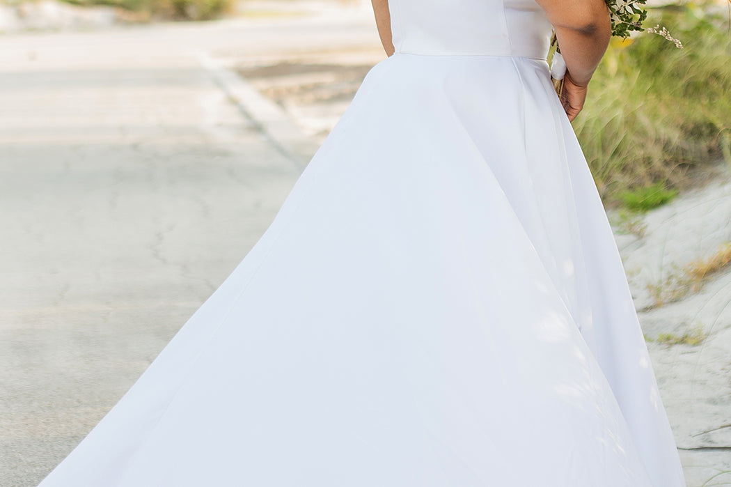 SC5281 Sydney's Bridal by Sydney's Closet Aline silhouette with scoop neckline and 1 inch straps dress features piped waistband and center back zipper available in ivory