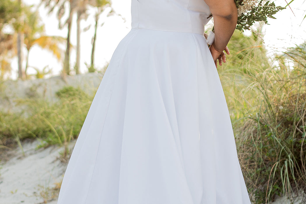SC5281 Sydney's Bridal by Sydney's Closet Aline silhouette with scoop neckline and 1 inch straps dress features piped waistband and center back zipper available in ivory