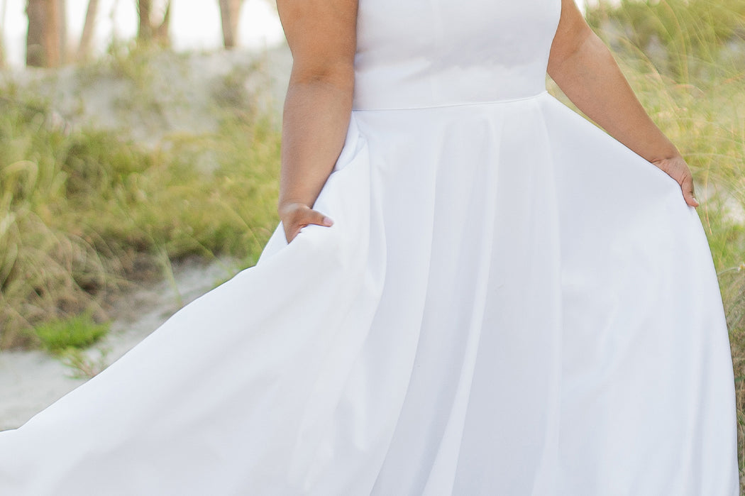 SC5281 Sydney's Bridal by Sydney's Closet Aline silhouette with scoop neckline and 1 inch straps dress features piped waistband and center back zipper available in ivory