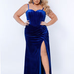 Sydney’s Closet SC7342 Royal blue. Slim/Fitted silhouette, strapless with optional spaghetti straps. Modified Basque waist, exposed corset boning on bodice and a ruched waist. Stretch velvet, with high slit and sweep train.