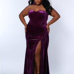 Sydney’s Closet SC7342 deep purple. Slim/Fitted silhouette, strapless with optional spaghetti straps. Modified Basque waist,  exposed corset boning on bodice and a ruched waist. Stretch velvet, with high slit and sweep train.