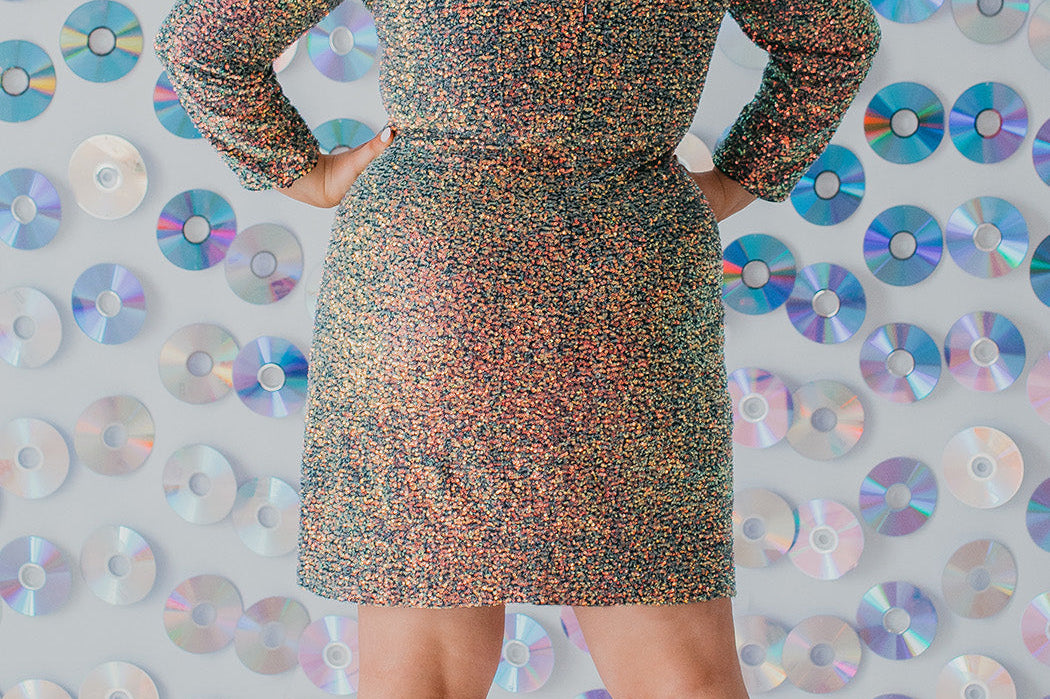 Sydney's CLoset SC8111 short plus size part y  dress with deep V-neckline, long sleeves and high slit. Multi dimensional sequins and ruched bodice.