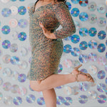 Sydney's CLoset SC8111 short plus size part y  dress with deep V-neckline, long sleeves and high slit. Multi dimensional sequins and ruched bodice.