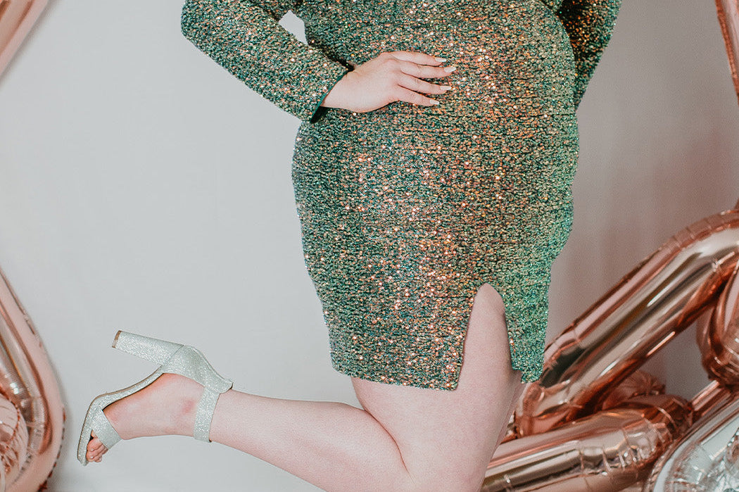 Sydney's CLoset SC8111 short plus size part y  dress with deep V-neckline, long sleeves and high slit. Multi dimensional sequins and ruched bodice.