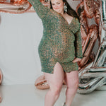 Sydney's CLoset SC8111 short plus size part y  dress with deep V-neckline, long sleeves and high slit. Multi dimensional sequins and ruched bodice.