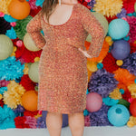 Sydney's CLoset SC8111 short plus size part y  dress with deep V-neckline, long sleeves and high slit. Multi dimensional sequins and ruched bodice.