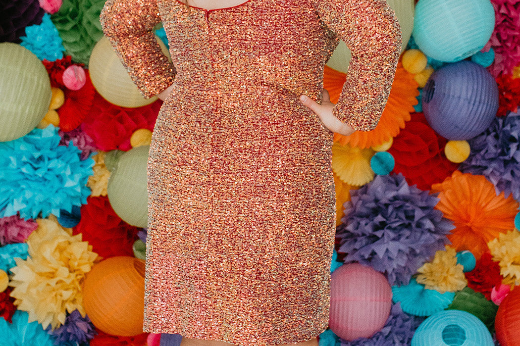 Sydney's CLoset SC8111 short plus size part y  dress with deep V-neckline, long sleeves and high slit. Multi dimensional sequins and ruched bodice.