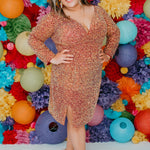 Sydney's CLoset SC8111 short plus size part y  dress with deep V-neckline, long sleeves and high slit. Multi dimensional sequins and ruched bodice.