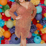 Sydney's CLoset SC8111 short plus size part y  dress with deep V-neckline, long sleeves and high slit. Multi dimensional sequins and ruched bodice.