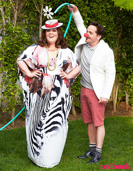 Commedian Melissa McCarthy wearing a zebra fabric and funny hat