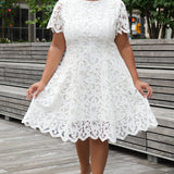 LWD style CE2601 in white. Scoop neckline, short sleeve, scalloed hem on sleeves and hem of dress. Princess silohuette, pockets and elegant Guipere lace. Long invisible center back zipper.  Celebrations by Sydney's Closet