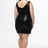 Celebrations by Sydney's Closet style CE2602 in shiny black metallic.  Slim fitted dress on curvy plus size model.  Dress features bra-friendly straps, nude illusion mesh insert, short mini skirt and dimentional sequin fabric with lots of stretch. 