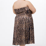 Plus size Tee length animal print dress.  fold over cuff detail, exposed corset boning, natural waistline, and A-line skirt with pockets and center back zipper. CE2603 available in sizes 14-24 in animal print. Celebrations by Sydney's Closet.
