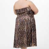 Plus size Tee length animal print dress.  fold over cuff detail, exposed corset boning, natural waistline, and A-line skirt with pockets and center back zipper. CE2603 available in sizes 14-24 in animal print. Celebrations by Sydney's Closet.