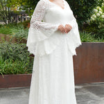 Boho crochet lace plus size wedding dress with V-neckline, illusion lace straps, illusion long flowy bell sleeves, natural wiasltine and slim A-line skirt finished with scalloped eyelash hem.  Available in ivory. Celebrations by Sydney's Closet style CE2604