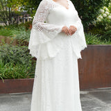 Boho crochet lace plus size wedding dress with V-neckline, illusion lace straps, illusion long flowy bell sleeves, natural wiasltine and slim A-line skirt finished with scalloped eyelash hem.  Available in ivory. Celebrations by Sydney's Closet style CE2604