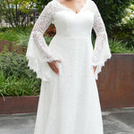 Boho crochet lace plus size wedding dress with V-neckline, illusion lace straps, illusion long flowy bell sleeves, natural wiasltine and slim A-line skirt finished with scalloped eyelash hem.  Available in ivory. Celebrations by Sydney's Closet style CE2604