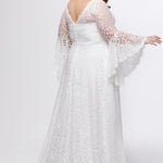 Boho crochet lace plus size wedding dress with V-neckline, illusion lace straps, illusion long flowy bell sleeves, natural wiasltine and slim A-line skirt finished with scalloped eyelash hem.  Available in ivory. Celebrations by Sydney's Closet style CE2604