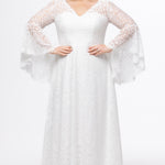 Boho crochet lace plus size wedding dress with V-neckline, illusion lace straps, illusion long flowy bell sleeves, natural wiasltine and slim A-line skirt finished with scalloped eyelash hem.  Available in ivory. Celebrations by Sydney's Closet style CE2604