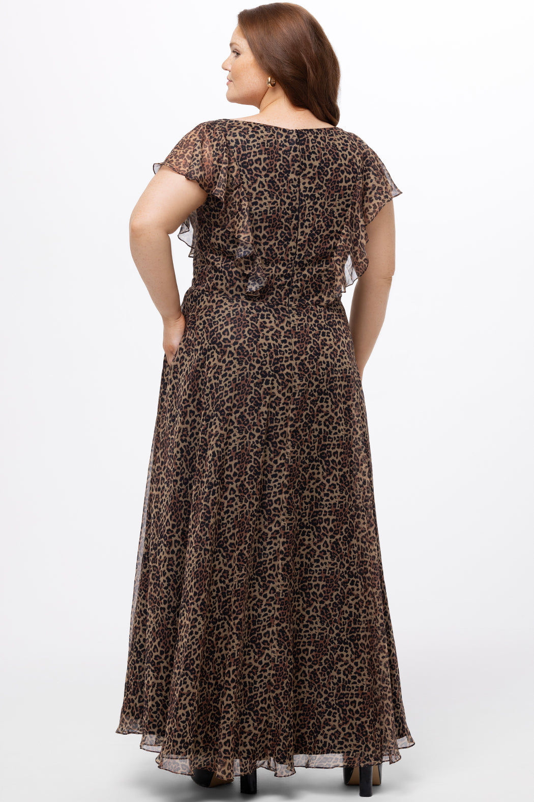 Celebrations by Sydney's Closet style CE2606 in animal print. 

Long plus size animal print dress.  V-neck, short flutter sleeves, natural waistline, pockets and ruffles on bodice princess seams. Left leg slit. Made from printed chiffon and light satin lining. High scoop back and center back zipper. 