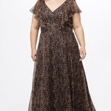 Plus size A-line floor length animal print gown. Flutter cap sleeves, ruffle starting at highpoint of shoulder down to natural waistline. Left leg slit and center back zipper.  CE2606 available in sizes 14-32 in animal print. Celebrations by Sydney's Closet.