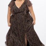 Plus size A-line floor length animal print gown. Flutter cap sleeves, ruffle starting at highpoint of shoulder down to natural waistline. Left leg slit and center back zipper.  CE2606 available in sizes 14-32 in animal print. Celebrations by Sydney's Closet.