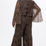 Plus size one-piece animal print jumpsuit. Long flowy chiffon sleeves and blouson bodice, elastic waist, and wide-leg pants. Center back zipper and scoop neckline. CE2607 available in sizes 14-28 in animal print. Celebration's by Sydney's Closet. 