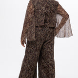 Plus size one-piece animal print jumpsuit. Long flowy chiffon sleeves and blouson bodice, elastic waist, and wide-leg pants. Center back zipper and scoop neckline. CE2607 available in sizes 14-28 in animal print. Celebration's by Sydney's Closet. 