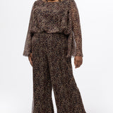 Plus size one-piece animal print jumpsuit. Long flowy chiffon sleeves and blouson bodice, elastic waist, and wide-leg pants. Center back zipper and scoop neckline. CE2607 available in sizes 14-28 in animal print. Celebration's by Sydney's Closet. 
