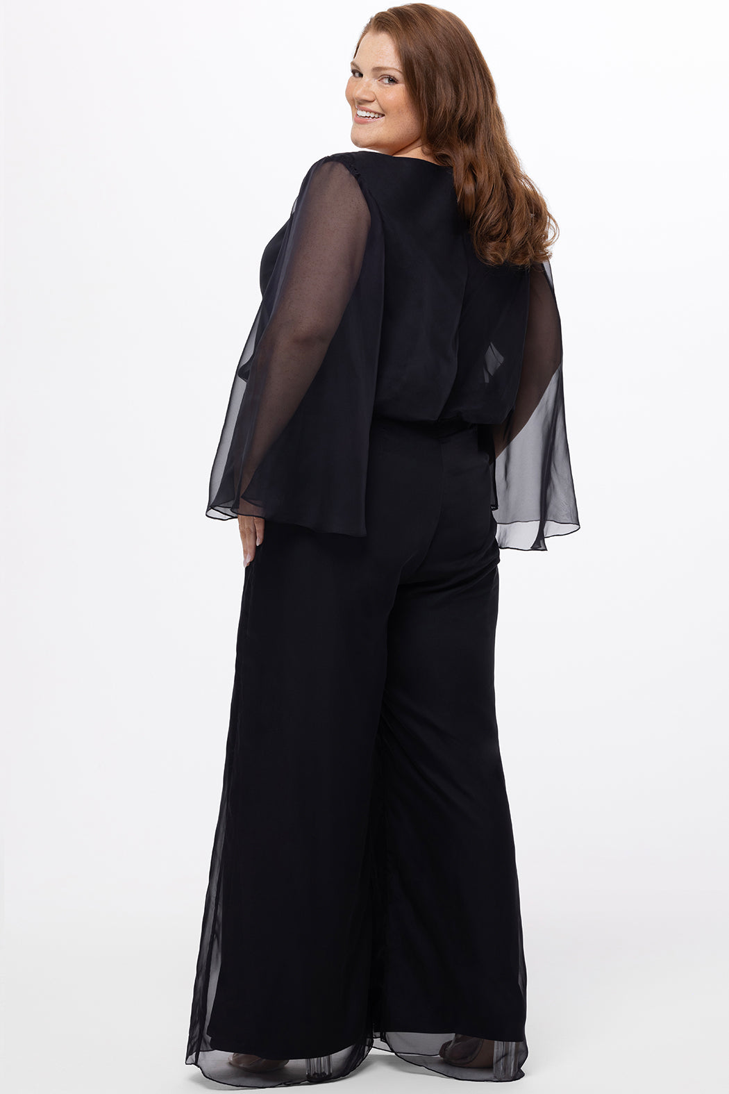 Celebration's by Sydney's Closet style CE2608 in black. 

Scoop neckline, long cape sleeve chiffon jumpsuit. Wide leg pants, blouson bodice and natural waistline. High scoop back with center back zipper. 