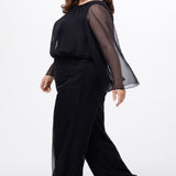 Celebration's by Sydney's Closet style CE2608 in black. 

Scoop neckline, long cape sleeve chiffon jumpsuit. Wide leg pants, blouson bodice and natural waistline. High scoop back with center back zipper. 