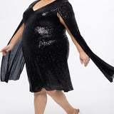 Sydney's Closet CE2609 in black.

Plus size sequin black short party dress. V-neckline, bra-friendly straps with attached cape sleeve detail, princess silhouette, slim A-line skirt. at knee-length.