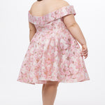 Celebrations by Sydney's Closet CE2610 in Light Pink Floral. 

Plus size knee-length party dress in metallic light pink floral brocde print. Off-the-shoulder neckline, natural waistline and A-line skirt with pockets. 