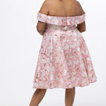Celebrations by Sydney's Closet CE2610 in Light Pink Floral. 

Plus size knee-length party dress in metallic light pink floral brocde print. Off-the-shoulder neckline, natural waistline and A-line skirt with pockets. 