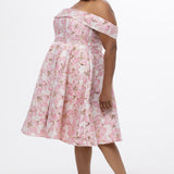 Celebrations by Sydney's Closet CE2610 in Light Pink Floral. 

Plus size knee-length party dress in metallic light pink floral brocde print. Off-the-shoulder neckline, natural waistline and A-line skirt with pockets. 