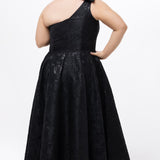 Celebrations by Sydney's Closet Style CE2614 in Black

Plus size maxi length formal dress. One-shoulder neckline with detachable bow at high point of shoulder, natural waistline and A-line skirt with pockets. 

Black floral brocade fabric. 