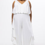 Celebration's by Sydney's Closet style CE2615 in Ivory. 

Crepe satin jumpsuit with a V-neck, bra-friendly straps, wide leg pants and blouson bodice. Ruffle detail on outer seams of pants. V-back with long center back zipper. 