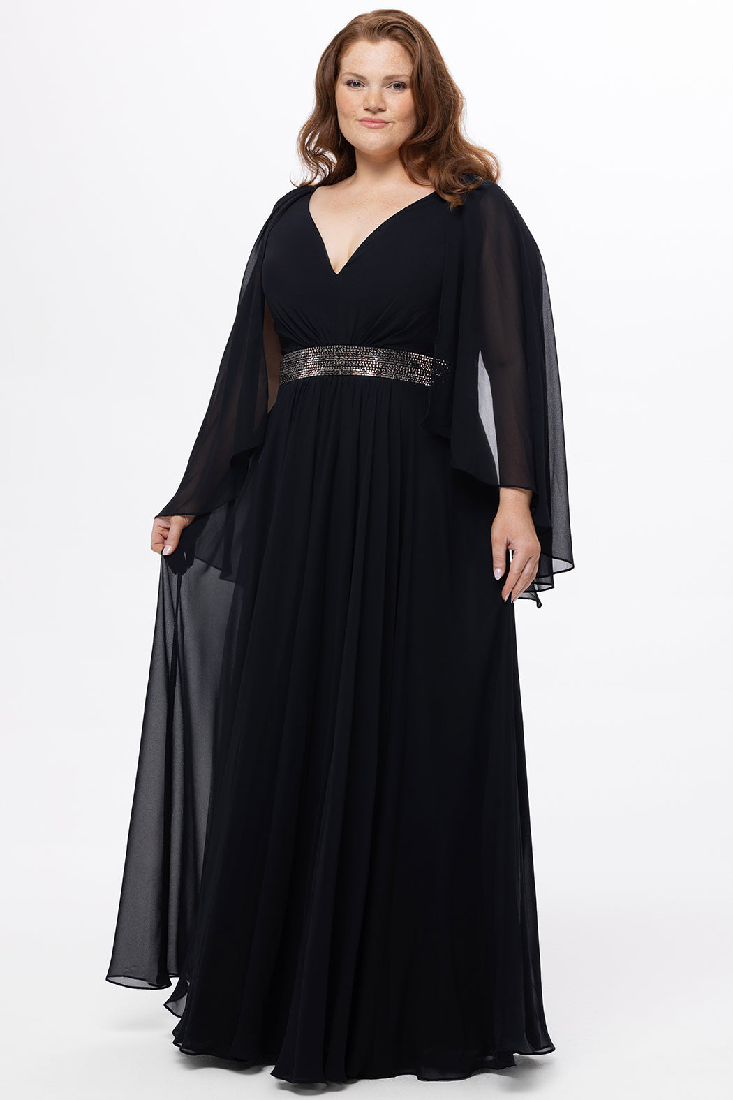 Celebration's by Sydney's Closet style CE2617 in black. 

A-line plus size chiffon gown with V-neck, long cape sleeves and beaded 3 inch waistband. No slit, center back zipper and high scoop back. 