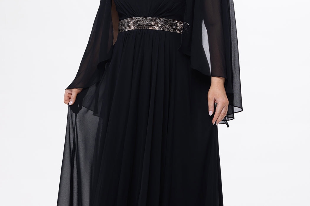 Celebration's by Sydney's Closet style CE2617 in black. 

A-line plus size chiffon gown with V-neck, long cape sleeves and beaded 3 inch waistband. No slit, center back zipper and high scoop back. 