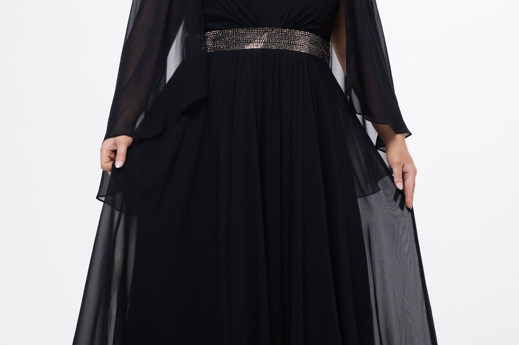 elebration's by Sydney's Closet style CE2617 in black. 

A-line plus size chiffon gown with V-neck, long cape sleeves and beaded 3 inch waistband. No slit, center back zipper and high scoop back.