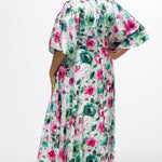 Celebration's by Sydney's Closet style CE2619 in floral. 

Empire waist, satin plus size floral gown with surplice bodice, V-neck and elbow length sleeves. Ankle length A-line skirt, center back zipper and pockets.  Includes optional belt. 