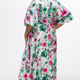 Celebration's by Sydney's Closet style CE2619 in floral. 

Empire waist, satin plus size floral gown with surplice bodice, V-neck and elbow length sleeves. Ankle length A-line skirt, center back zipper and pockets.  Includes optional belt. 