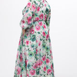 Celebration's by Sydney's Closet style CE2621 in floral. 

Button down plus size ankle length floral gown made from printed organza. V-neck, long pouf sleeves with cuff and optional belt. A-line skirt with pockets.