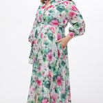 Celebration's by Sydney's Closet style CE2621 in floral. 

Button down plus size ankle length floral gown made from printed organza. V-neck, long pouf sleeves with cuff and optional belt. A-line skirt with pockets. 
