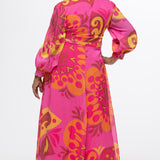 Celebration's by Sydney's Closet style CE2622 in abstract print. 

Button down plus size ankle length gown made from printed organza. V-neck, long pouf sleeves with cuff and optional belt. A-line skirt with pockets.