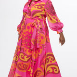 Celebration's by Sydney's Closet style CE2622 in abstract print. 

Button down plus size ankle length gown made from printed organza. V-neck, long pouf sleeves with cuff and optional belt. A-line skirt with pockets.